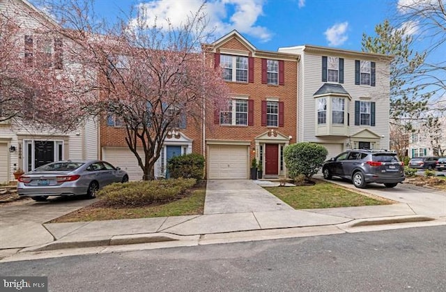 19008 Marksburg Ct, Germantown, MD 20874 - townhome / multi-family property featuring brick siding and driveway