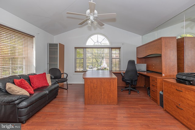 office featuring plenty of natural light, a ceiling fan, vaulted ceiling, and wood finished floors