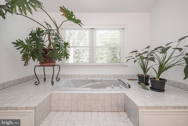 bathroom with a garden tub