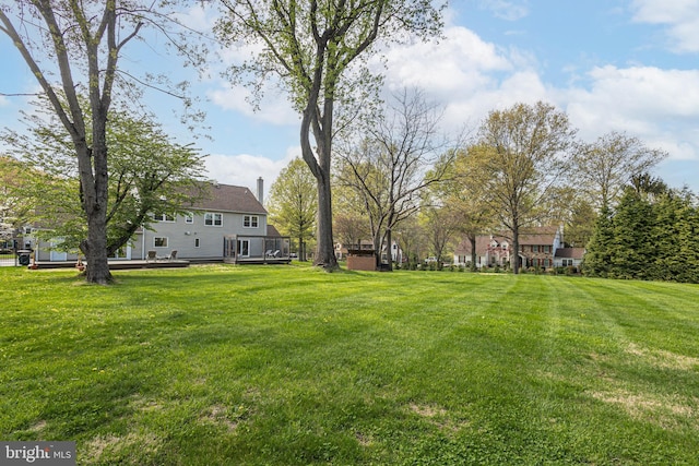 view of yard with a deck