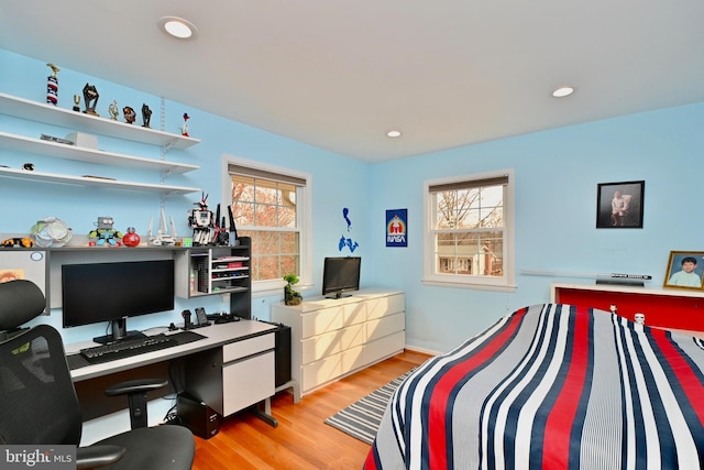 bedroom featuring recessed lighting and light wood-style floors