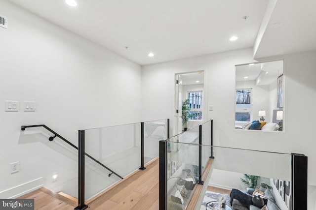 1104 N Bodine St, Philadelphia, PA 19123 - stairway featuring recessed lighting, baseboards, and wood finished floors