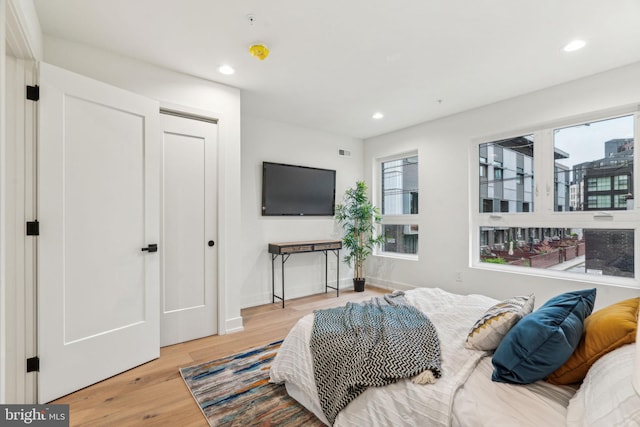 1104 N Bodine St, Philadelphia, PA 19123 - bedroom with recessed lighting, baseboards, and wood finished floors