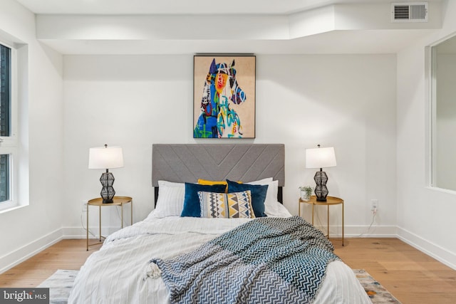 1104 N Bodine St, Philadelphia, PA 19123 - bedroom featuring baseboards, visible vents, and wood finished floors