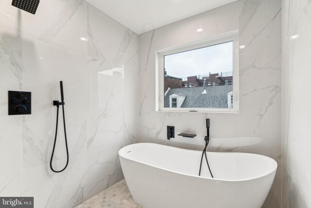 1104 N Bodine St, Philadelphia, PA 19123 - full bathroom featuring tile walls, a tile shower, and a soaking tub