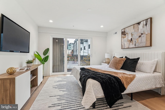 1104 N Bodine St, Philadelphia, PA 19123 - bedroom featuring access to outside, visible vents, light wood-style flooring, and recessed lighting
