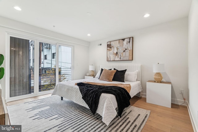 1104 N Bodine St, Philadelphia, PA 19123 - bedroom featuring access to exterior, visible vents, baseboards, light wood-style floors, and recessed lighting