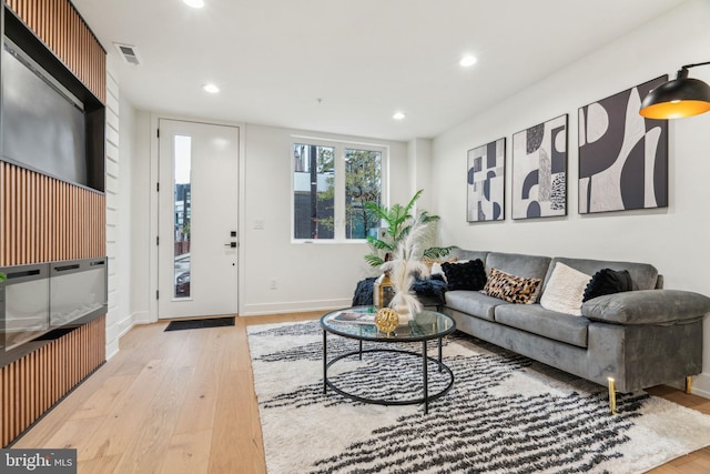 1104 N Bodine St, Philadelphia, PA 19123 - living room featuring recessed lighting, baseboards, visible vents, and wood finished floors