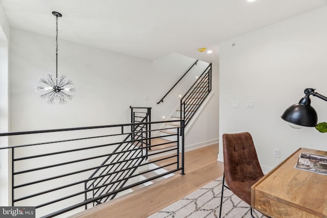 1104 N Bodine St, Philadelphia, PA 19123 - interior space with an inviting chandelier, baseboards, and wood finished floors