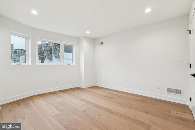 1104 N Bodine St, Philadelphia, PA 19123 - empty room featuring visible vents, light wood-style flooring, and baseboards