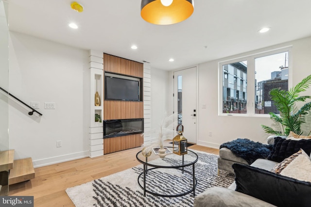 1104 N Bodine St, Philadelphia, PA 19123 - living area featuring recessed lighting, baseboards, and wood finished floors