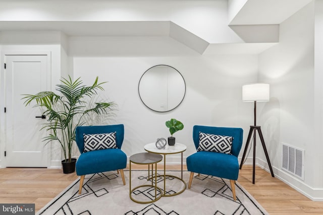 1104 N Bodine St, Philadelphia, PA 19123 - living area featuring visible vents, baseboards, and wood finished floors