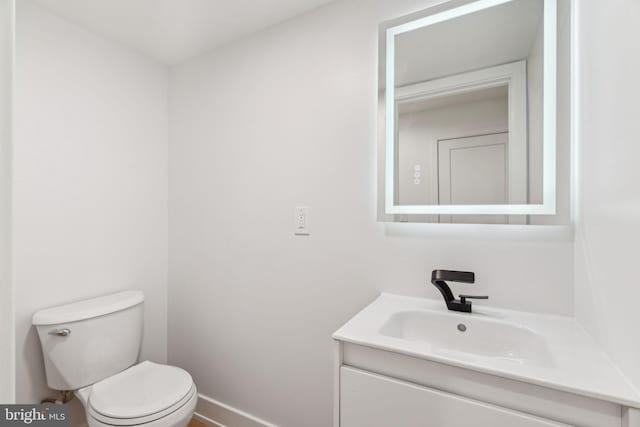 1104 N Bodine St, Philadelphia, PA 19123 - bathroom featuring vanity, baseboards, and toilet