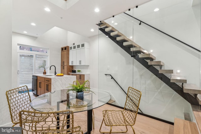 1104 N Bodine St, Philadelphia, PA 19123 - dining space featuring baseboards, recessed lighting, light wood-style flooring, and stairs