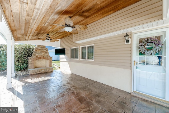 view of patio featuring ceiling fan