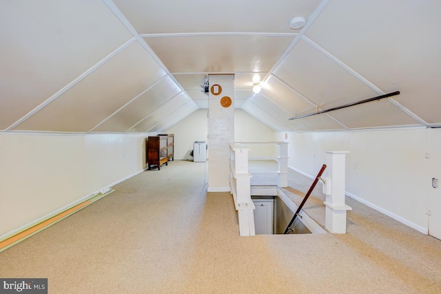 bonus room featuring carpet floors, baseboards, and lofted ceiling
