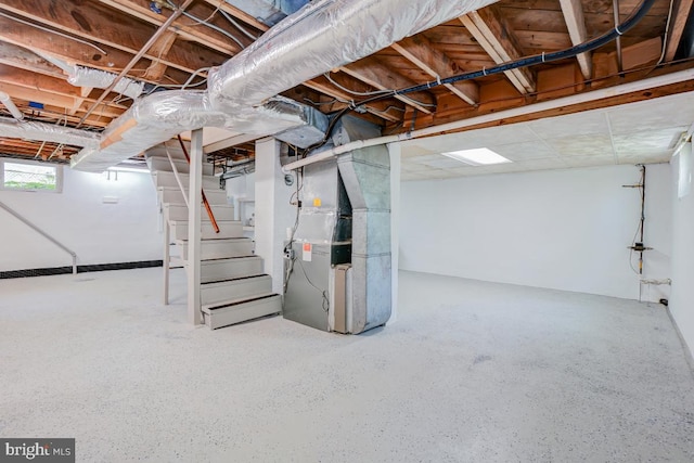basement featuring heating unit