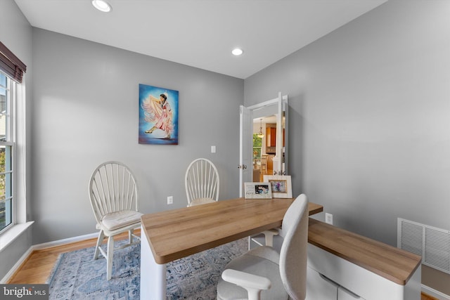 dining area with recessed lighting, baseboards, light wood finished floors, and visible vents