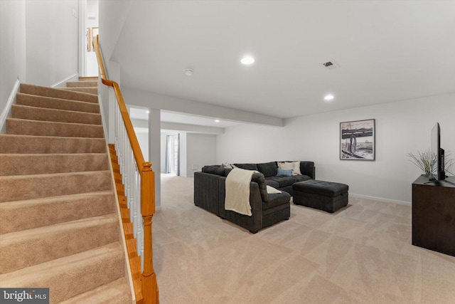 living room featuring recessed lighting, carpet flooring, baseboards, and stairway