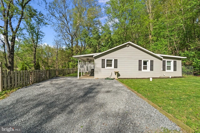 417 Twin Arch Rd, Mount Airy, MD 21771 - exterior space featuring fence, a front yard, and gravel driveway
