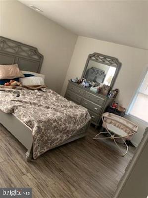 25 Bucknell Rd, Somers Point, NJ 08244 - bedroom featuring dark wood-style flooring