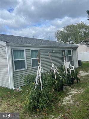 25 Bucknell Rd, Somers Point, NJ 08244 - back of house with fence and a shingled roof