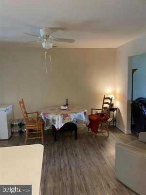 25 Bucknell Rd, Somers Point, NJ 08244 - dining space with wood finished floors and ceiling fan