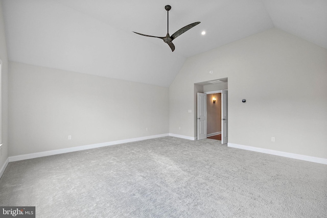 additional living space with baseboards, carpet, a ceiling fan, and lofted ceiling