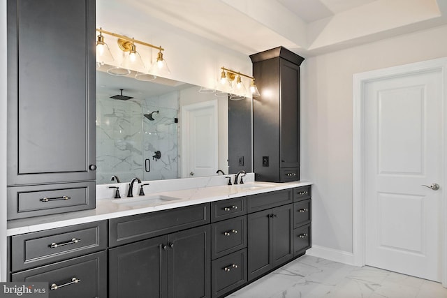 bathroom with a sink, a marble finish shower, double vanity, and marble finish floor