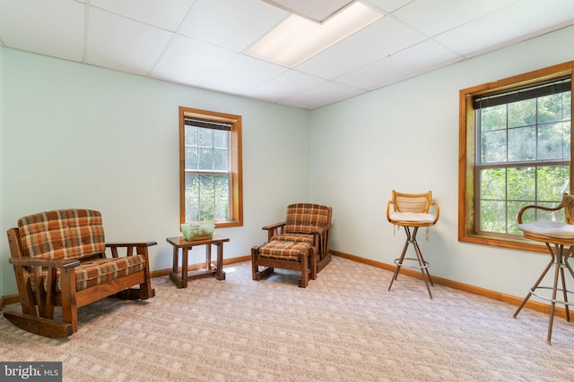13478 Spruce, King George, VA 22485 - living area featuring a paneled ceiling, plenty of natural light, carpet floors, and baseboards