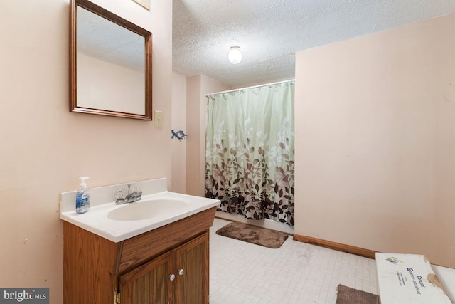13478 Spruce, King George, VA 22485 - full bath with vanity, a textured ceiling, and curtained shower
