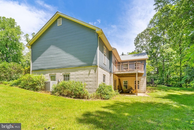 13478 Spruce, King George, VA 22485 - back of property with a yard, a wooden deck, and central AC