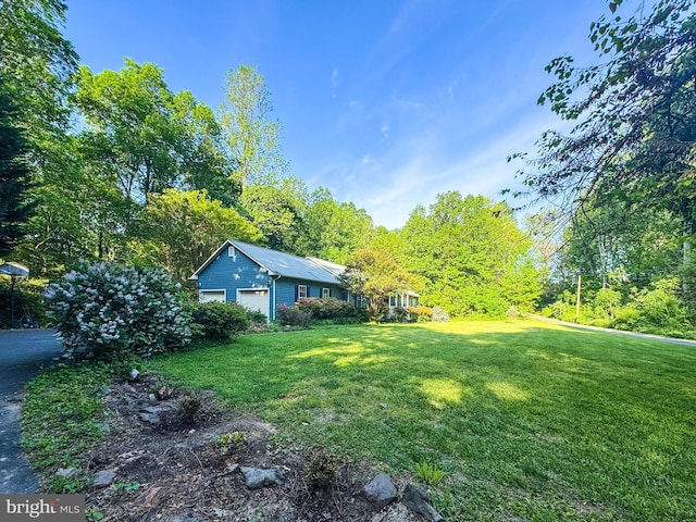 13478 Spruce, King George, VA 22485 - view of green lawn featuring a garage