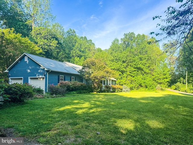 13478 Spruce, King George, VA 22485 - view of green lawn featuring a garage
