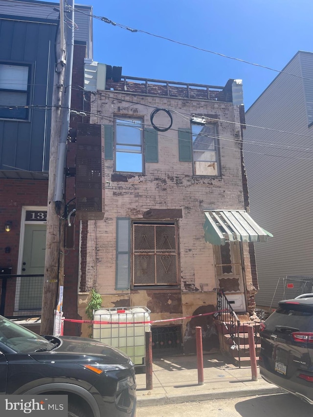 1321 S Dover St, Philadelphia, PA 19146 - view of front facade featuring brick siding