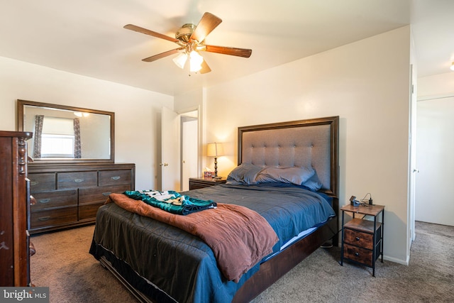 carpeted bedroom featuring a ceiling fan