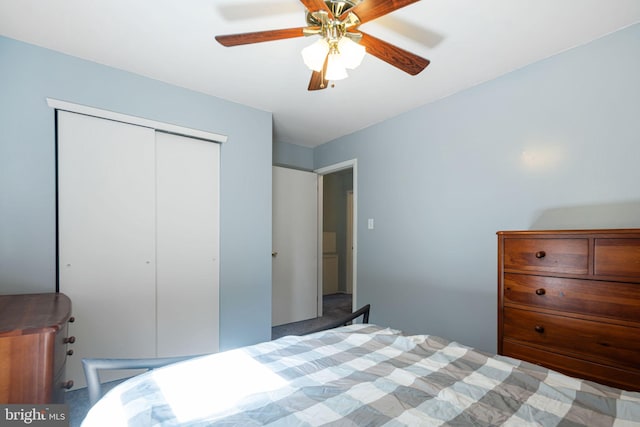 bedroom featuring a ceiling fan and a closet