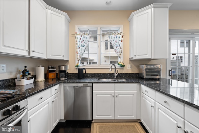 8878 Ashgrove House Ln, Vienna, VA 22182 - kitchen featuring a sink, stainless steel appliances, and white cabinets