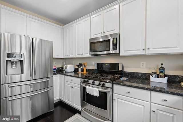 8878 Ashgrove House Ln, Vienna, VA 22182 - kitchen featuring stainless steel appliances and white cabinetry