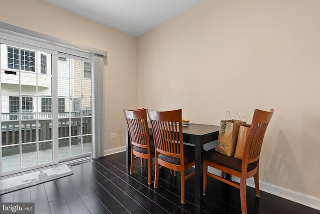 8878 Ashgrove House Ln, Vienna, VA 22182 - dining space featuring baseboards and wood finished floors