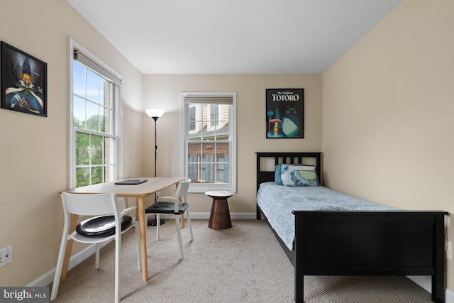 8878 Ashgrove House Ln, Vienna, VA 22182 - carpeted bedroom featuring baseboards and multiple windows