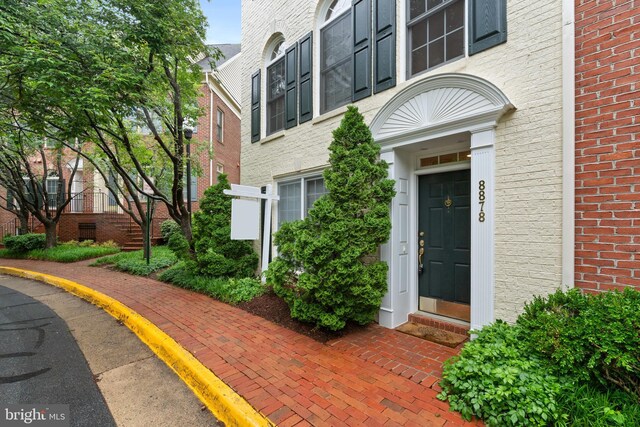 8878 Ashgrove House Ln, Vienna, VA 22182 - entrance to property with brick siding