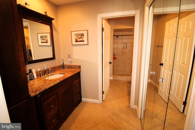 646 River Oak Ct Unit A-8Bs, Salisbury, MD 21801 - full bath with tile patterned floors, tiled shower, vanity, and baseboards