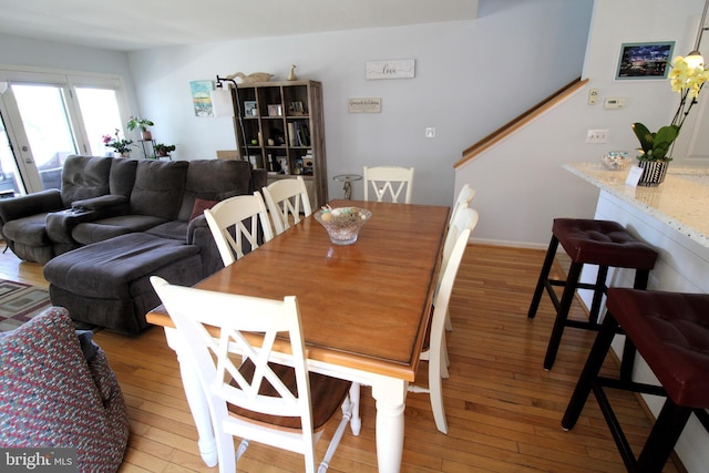 646 River Oak Ct Unit A-8Bs, Salisbury, MD 21801 - dining room featuring light wood finished floors and stairway