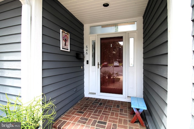 entrance to property with a porch