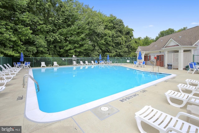 7524 Snowpea Ct Unit 9, Alexandria, VA 22306 - pool with a patio area and fence