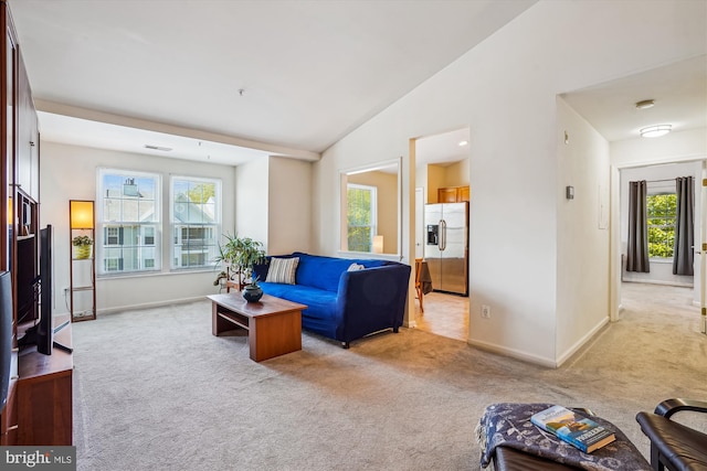 7524 Snowpea Ct Unit 9, Alexandria, VA 22306 - living area with baseboards, light colored carpet, and a wealth of natural light