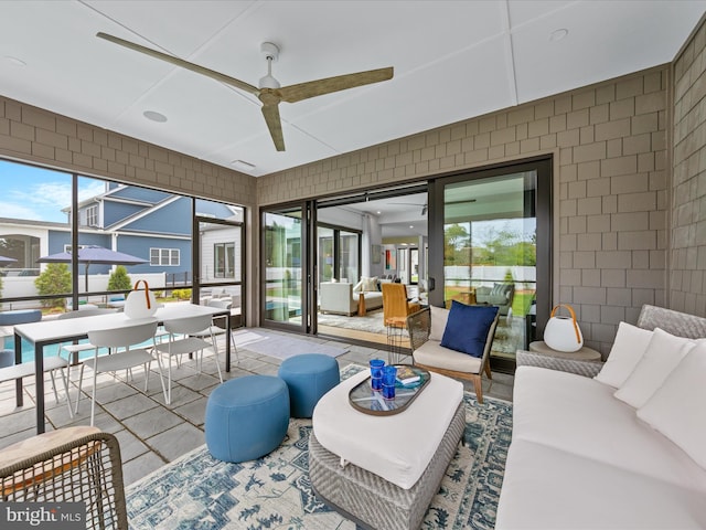 sunroom featuring a healthy amount of sunlight
