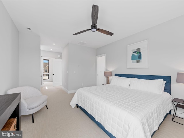 carpeted bedroom featuring recessed lighting, baseboards, and a ceiling fan