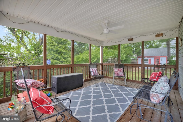 sunroom with ceiling fan and a wealth of natural light
